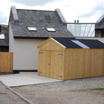 Garage with onduline roof.