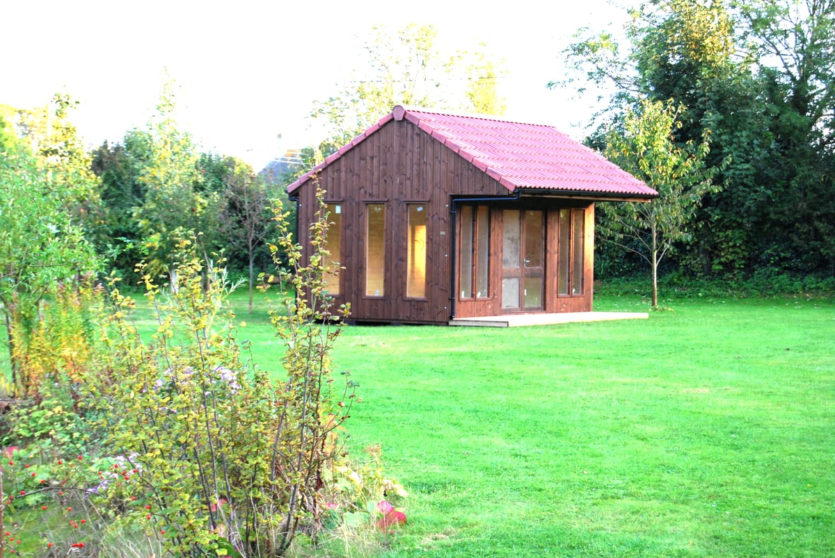 Double glazed garden building with a tiled roof