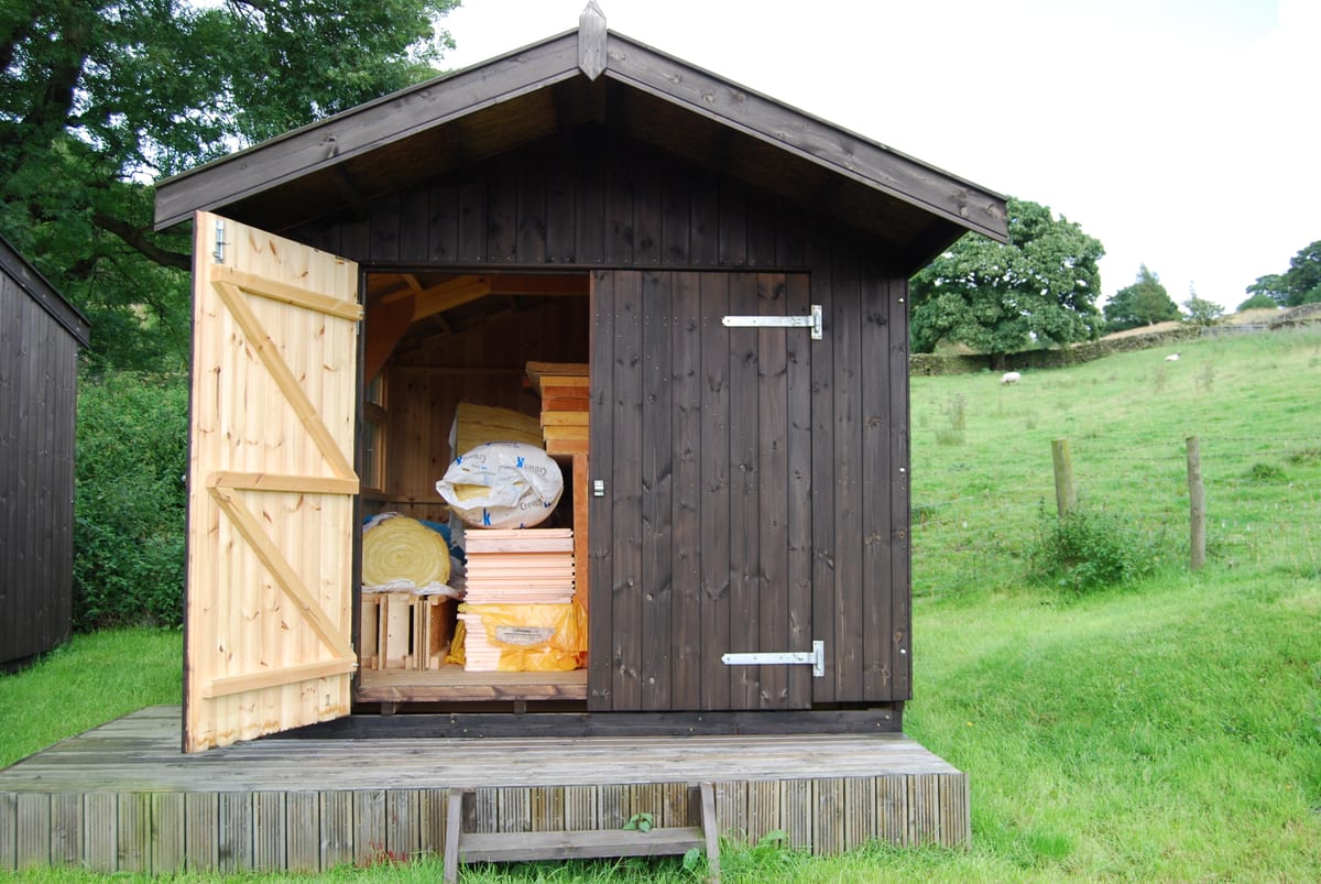 Timber store and workshop with double doors